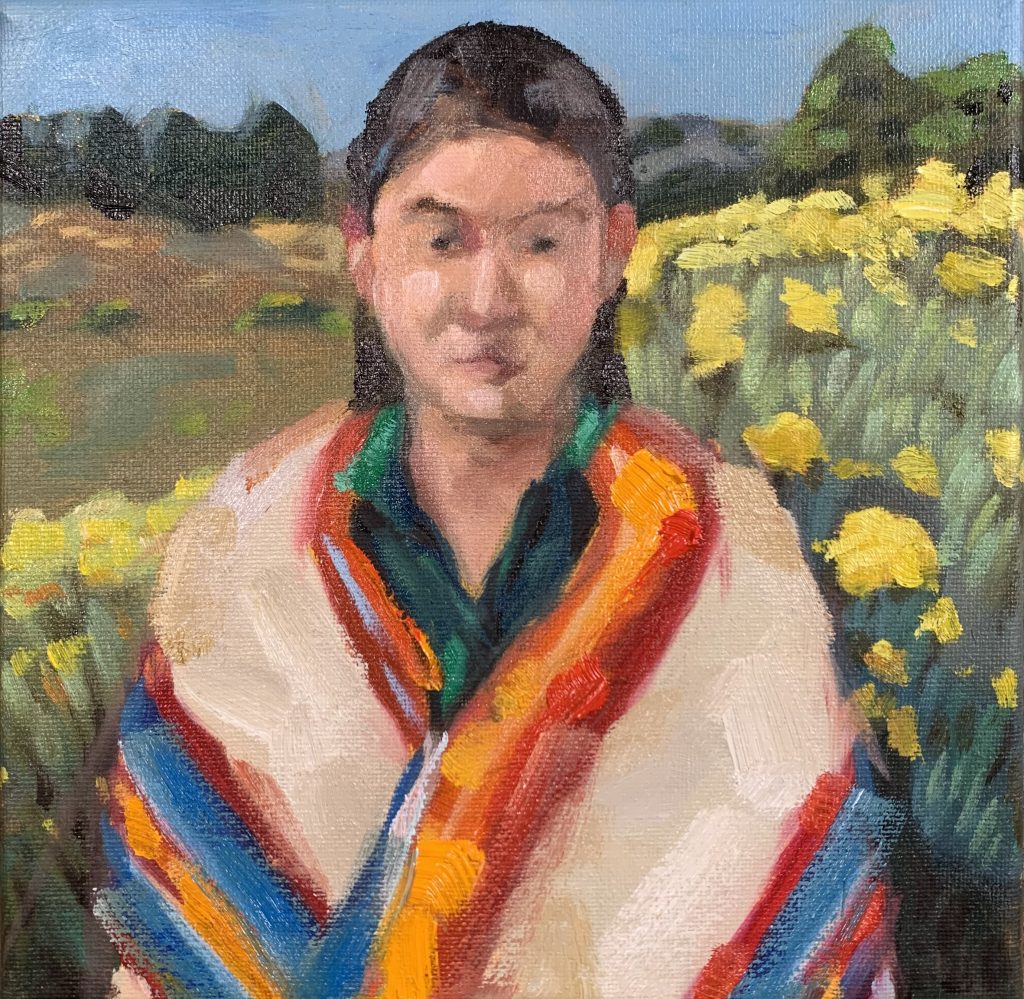 Portrait of a girl with blooming sagebrush
